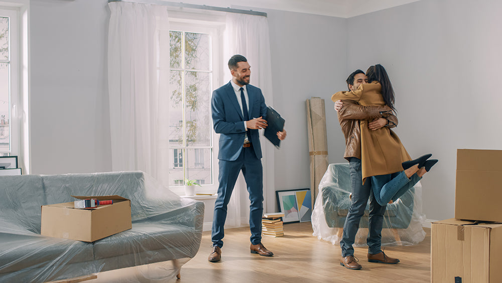 Home buyers moving into a home with new flooring